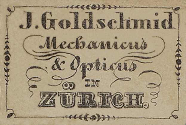 Alte Visitenkarte für "J. Goldschmidt Mechanicus & Optics in Zürich", wahrscheinlich aus dem frühen 20. Jahrhundert, mit Auflistung der Unternehmensdienstleistungen.