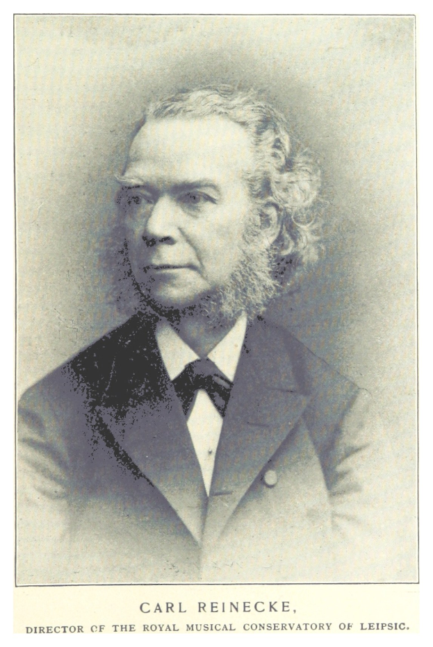 Schwarz-weißes Portr├Ąt von Carl Reinecke, Direktor des K├äiglichen Musikalischen Konservatoriums Leipzig, in einem Anzug mit Text unten.